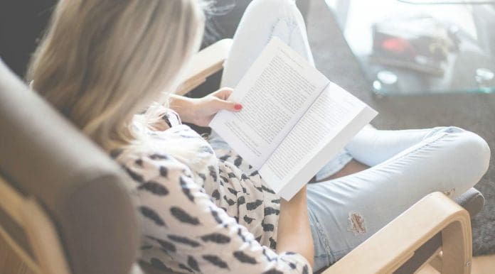 woman reading books