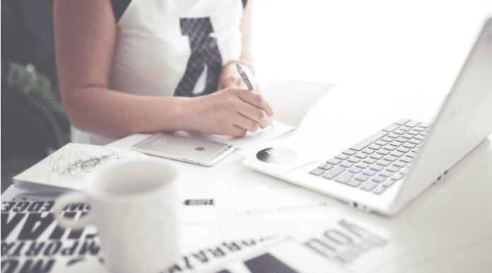 woman working laptop sheets