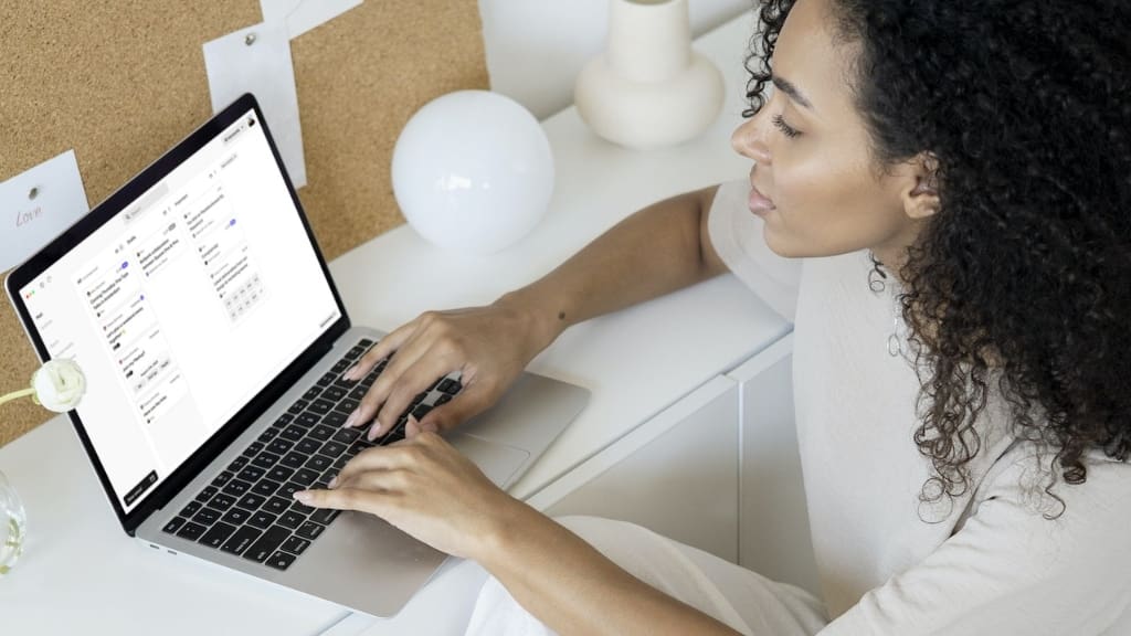 Woman looking at email beta of Murdon Woman looking at email beta of Murdon