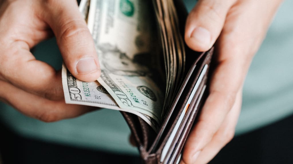 wallet-cash-money Wallet with money representing finances