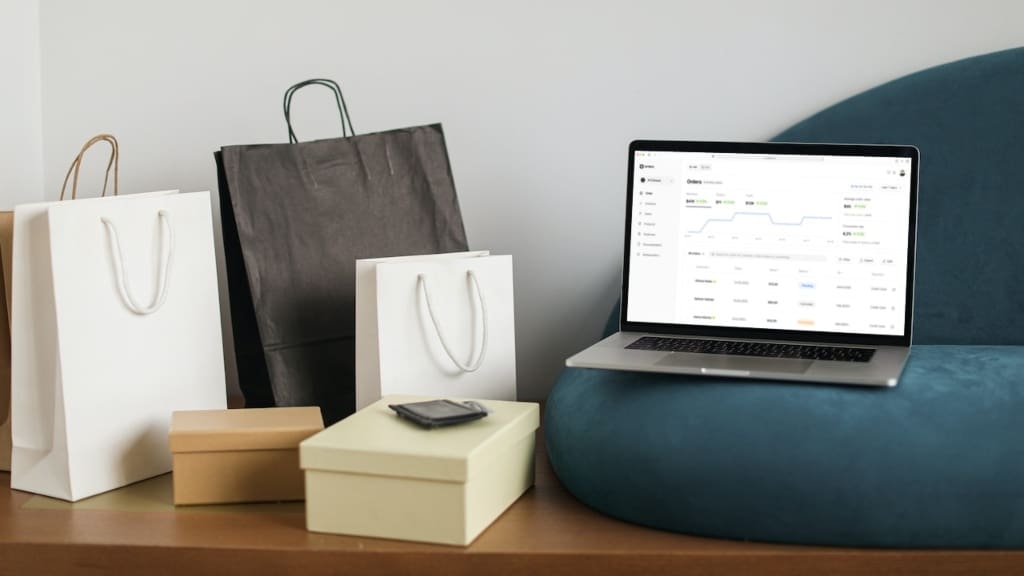 iorders on macbook with shopping bags