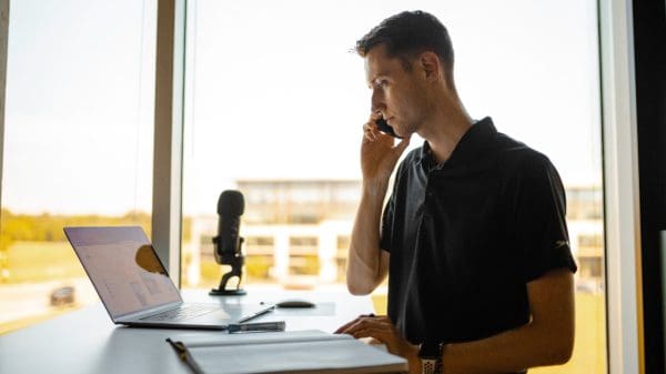 Person on phone representing risk management