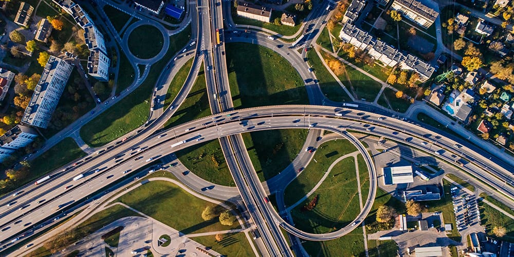 Commercial real estate overhead with highway in between.