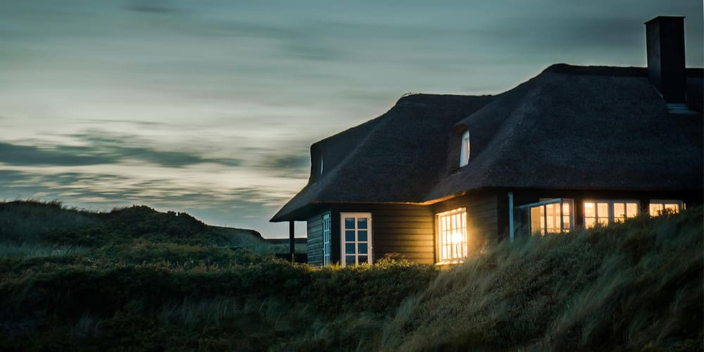 Dark house at dusk, a possible pocket listing to be snatched up.