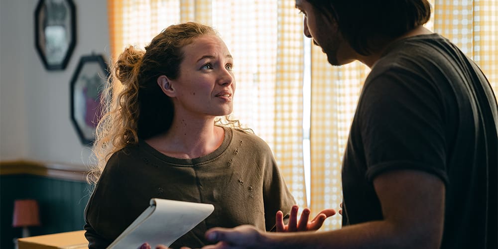 Woman and man in an argument determining if one was lying.