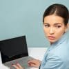 Women looking concerned away from computer representing scared home buyers