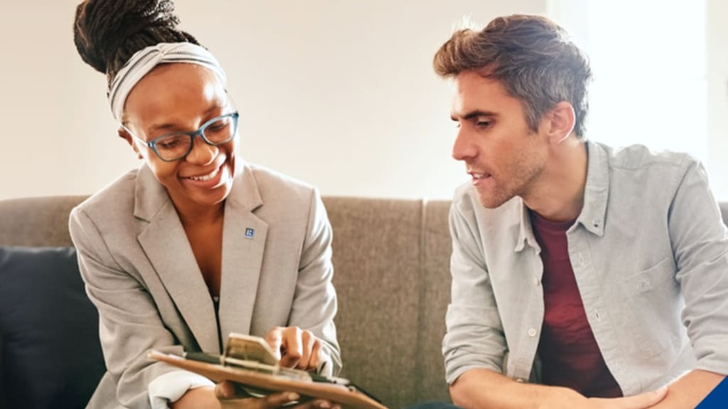 Woman and man in real estate