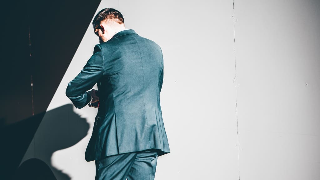 person looking at watch representing failed transactions