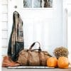 Porch with pumpkins and coat, representing fall business