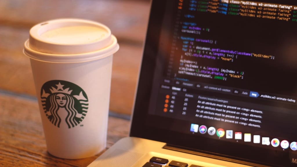 starbucks coffee with computer