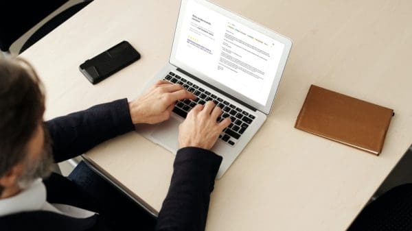 Man using Ellie browser extension on computer